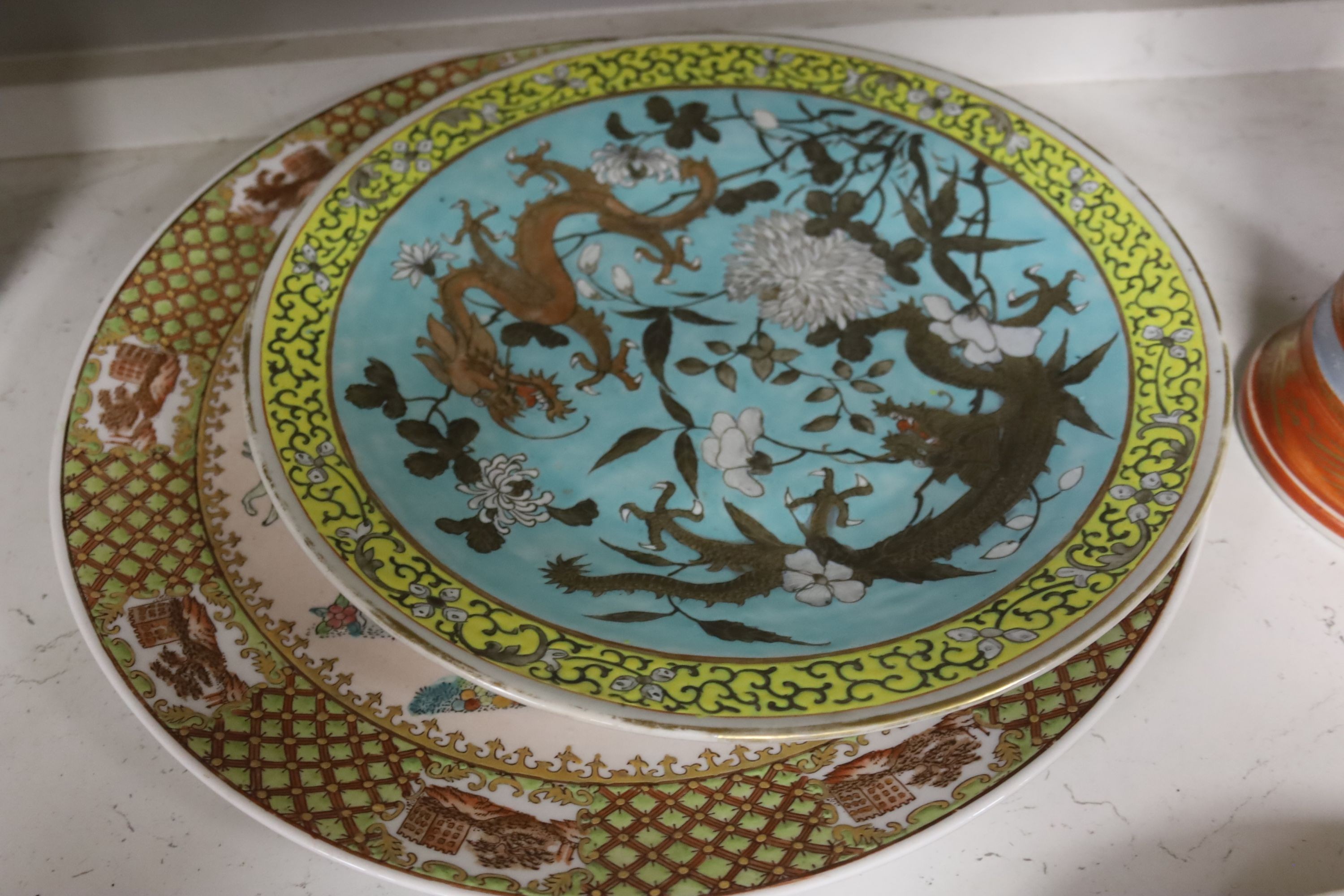 Two Chinese ‘millefleur’ dishes, a turquoise ground ‘Dragon’ dish Guangxu mark and period, a late 19th century famille rose jar etc.